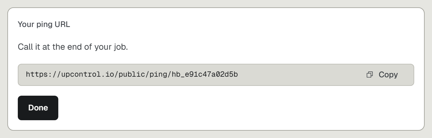 The heartbeat panel showing the ping URL a scheduled job calls when it finishes
